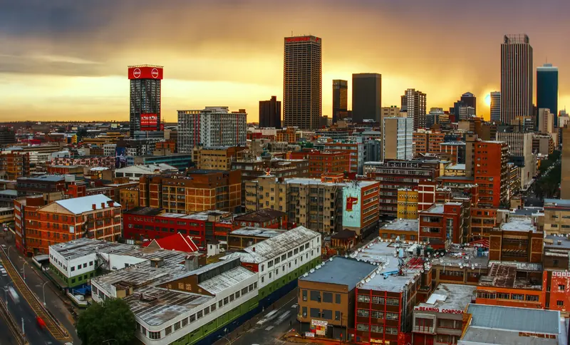 Central Johannesburg rooftops and towers in golden-hour light